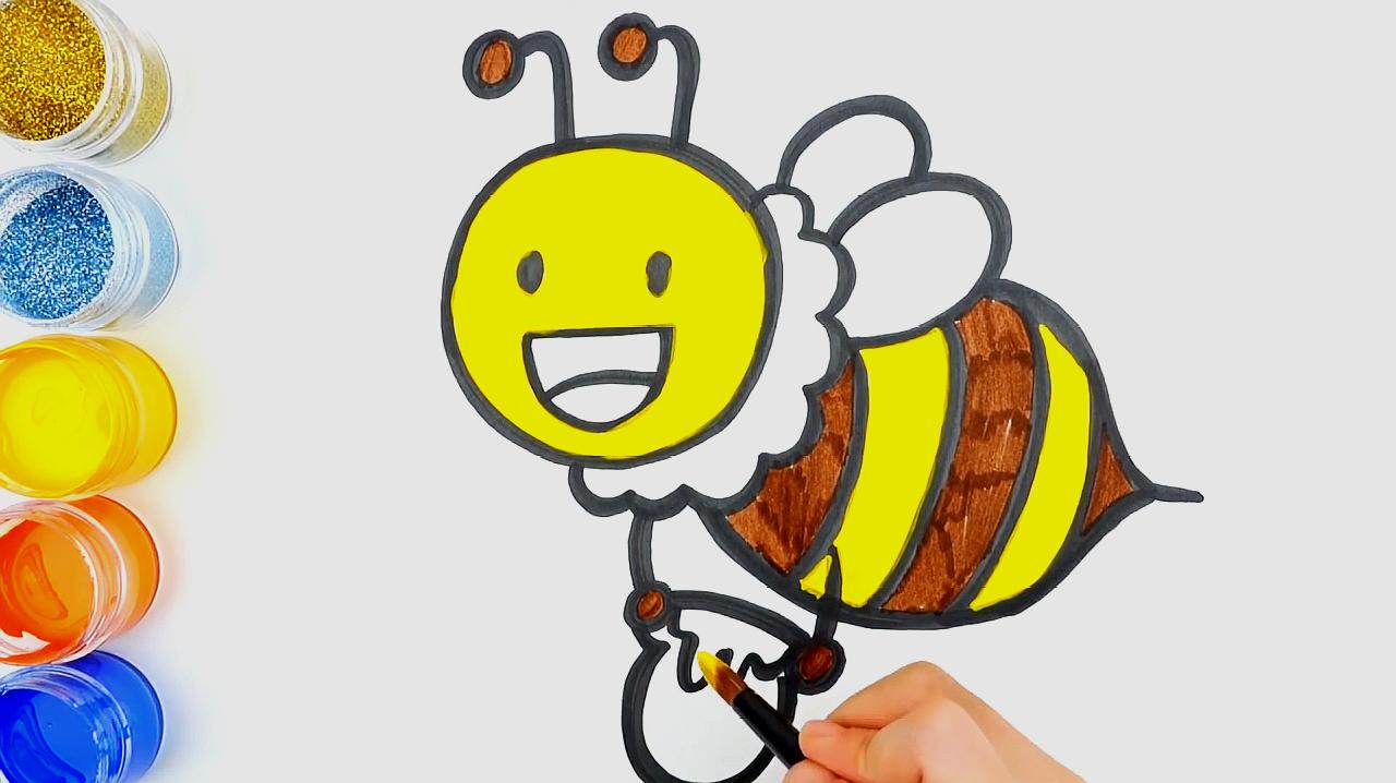 连接字母b画出蜜蜂的是身体和尾巴,再画上翅膀和脚,最后涂上颜色