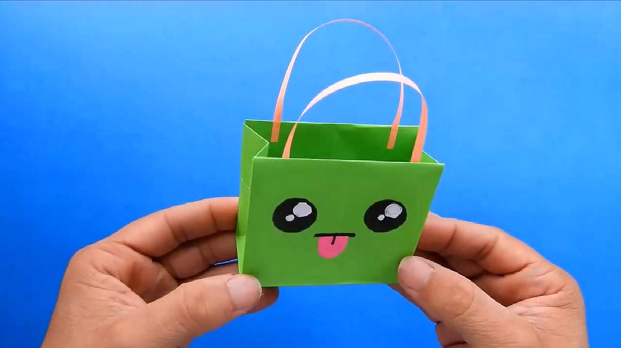 来源:好看视频-很简单的迷你包包手工折纸,萌萌哒小朋友很喜欢,漂亮