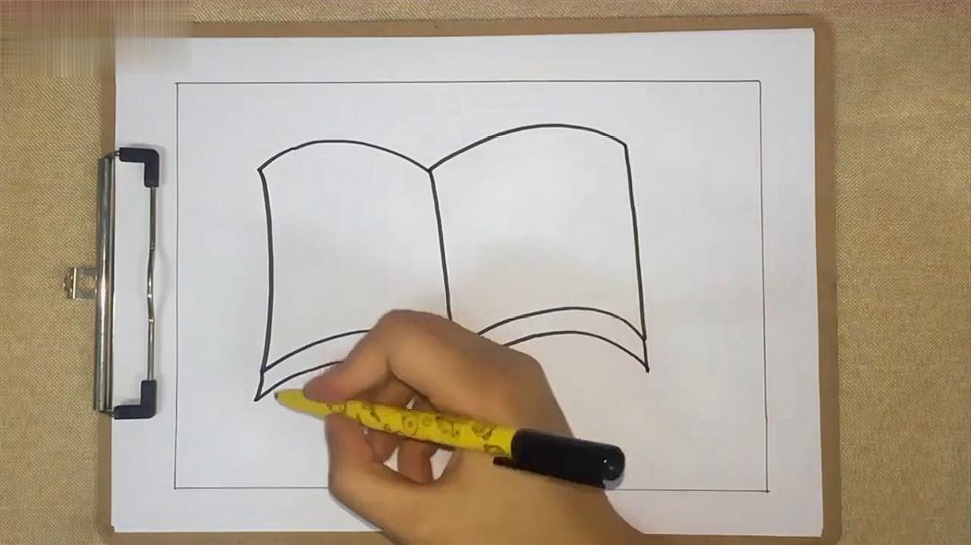 3书本的素描画法:先画出一个长方体,将数的厚度涂成黑色,数的封面用